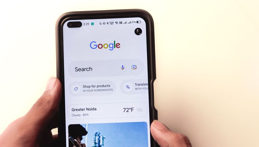 Person checking local business on phone