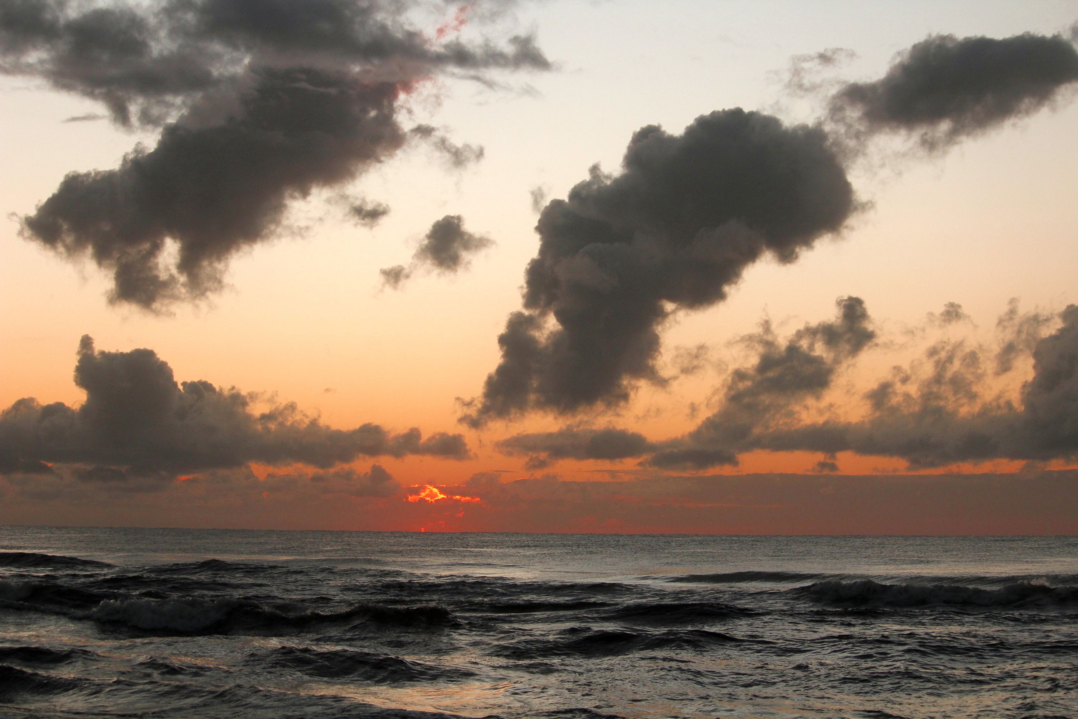 Clouds over Sea Shore at Sunset · Free Stock Photo