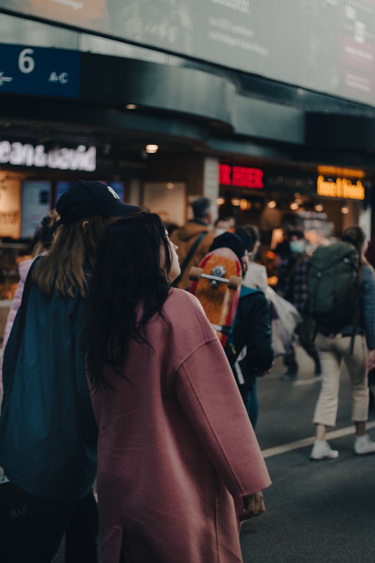 People Walking Among People At Airport