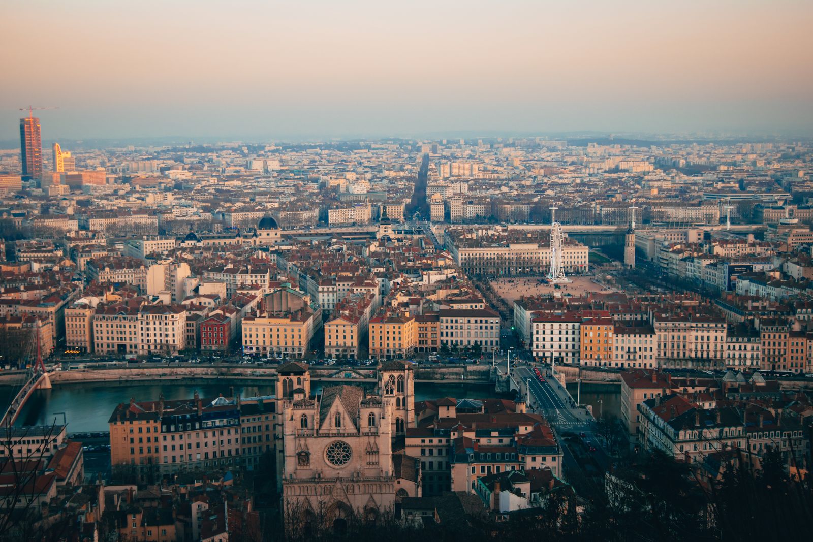 Golden-hour panorama of Lyon from Fourvière — the old town, cathedral and rivers