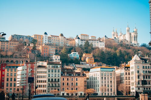 Clear Sky over Buildings on Hill in City