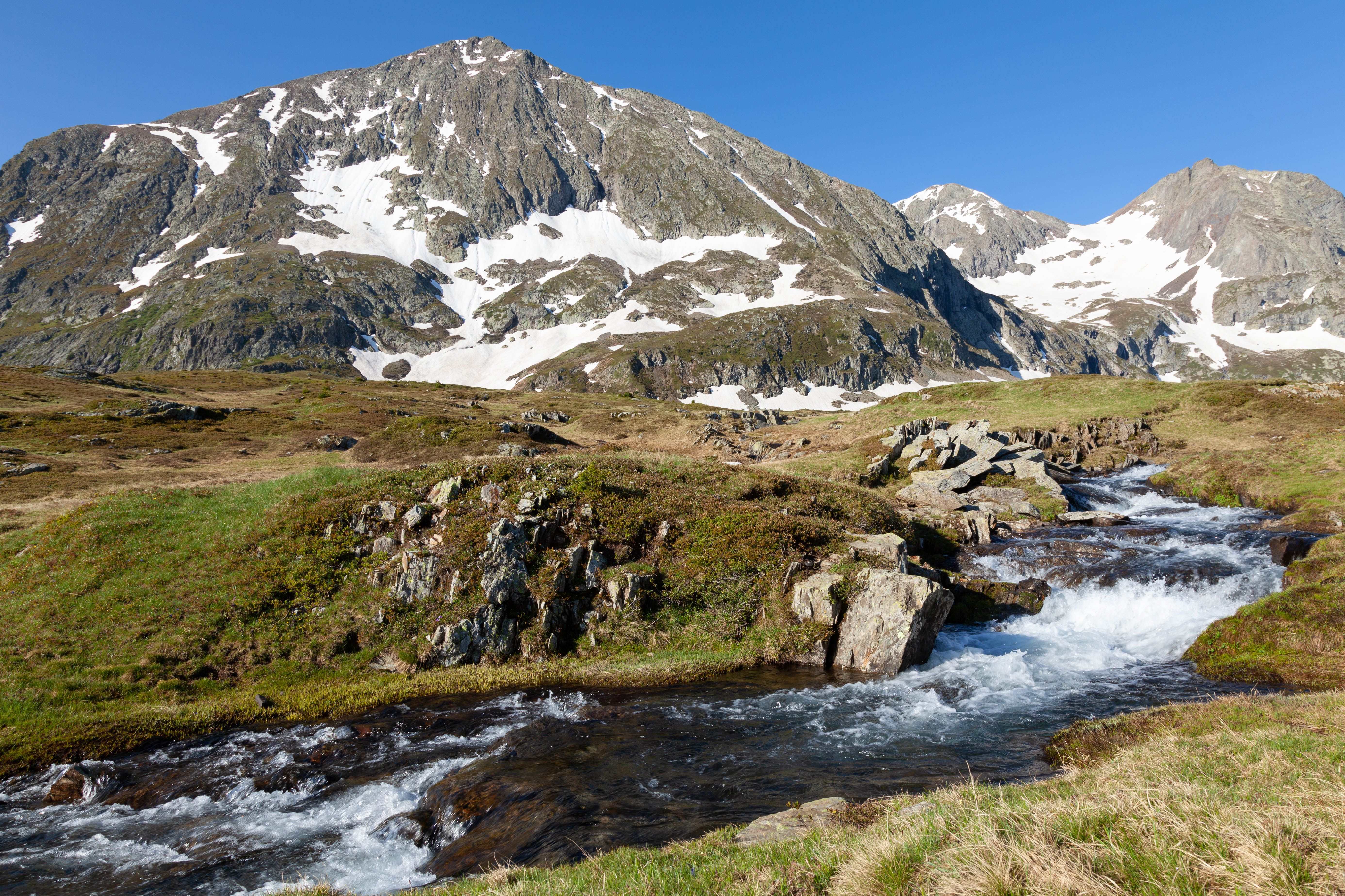 Stream Flowing in Mountains Landscape · Free Stock Photo