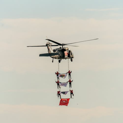Foto stok gratis akrobat, bendera, heli