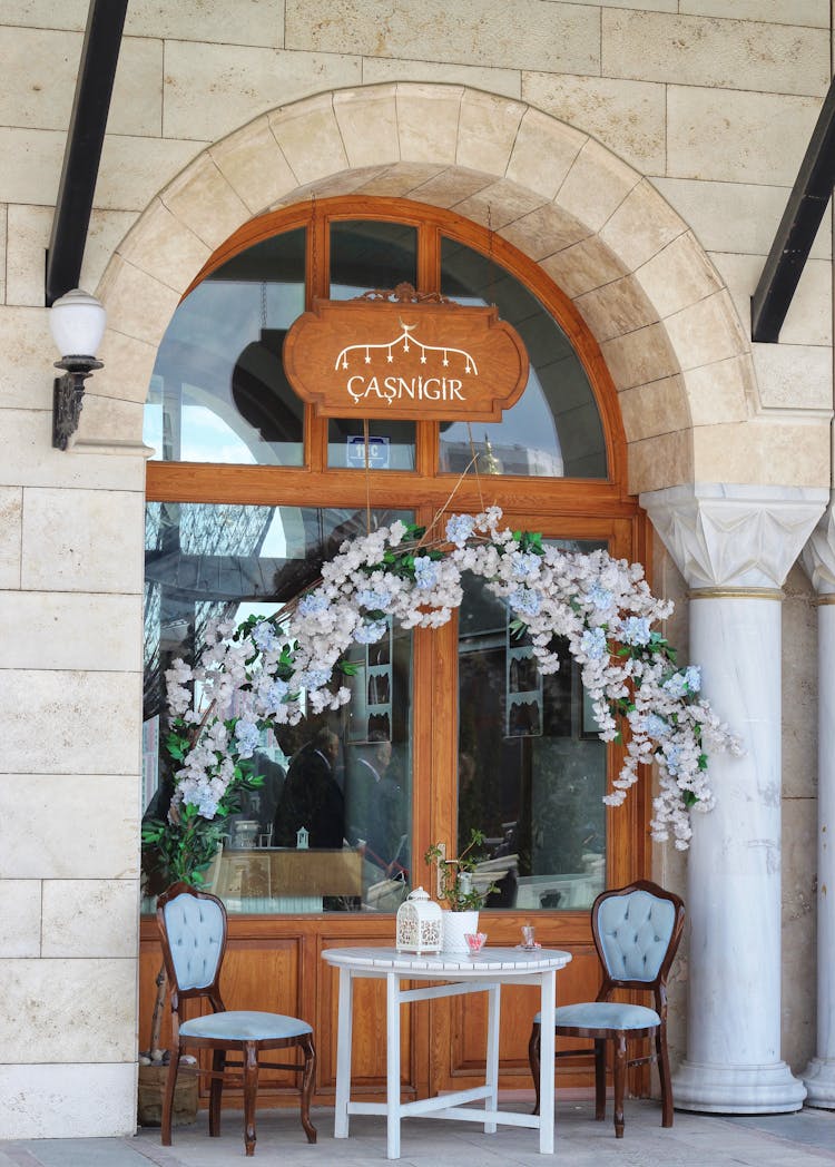 Chairs And A Table Outside A Restaurant