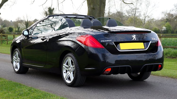 Modern Convertible Car On Road In Park