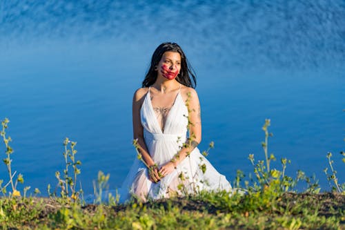 Brunette with Missing and Murdered Indigenous Women Symbol on Face