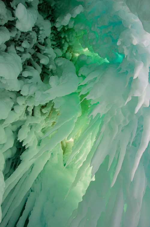 Free Explore the stunning frozen ice formations resembling cascading waterfalls in winter cold. Stock Photo