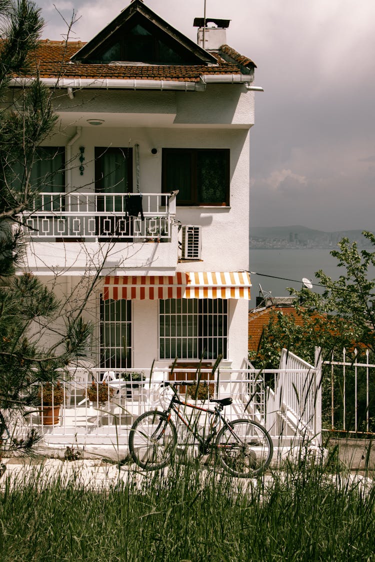 Bike Near Holiday House At Seashore