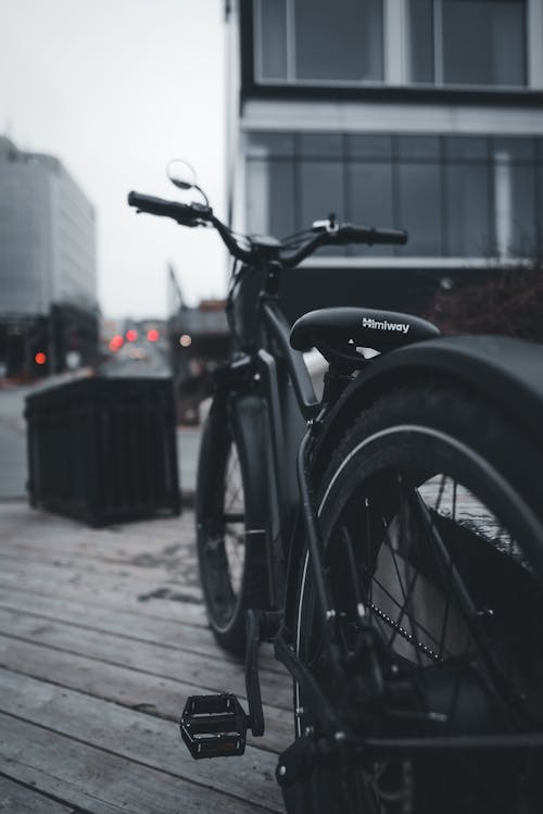 A Bicycle on the Sidewalk in City 