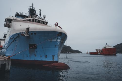 Free Large ships moored at a harbor in Newfoundland on a cloudy day. Stock Photo