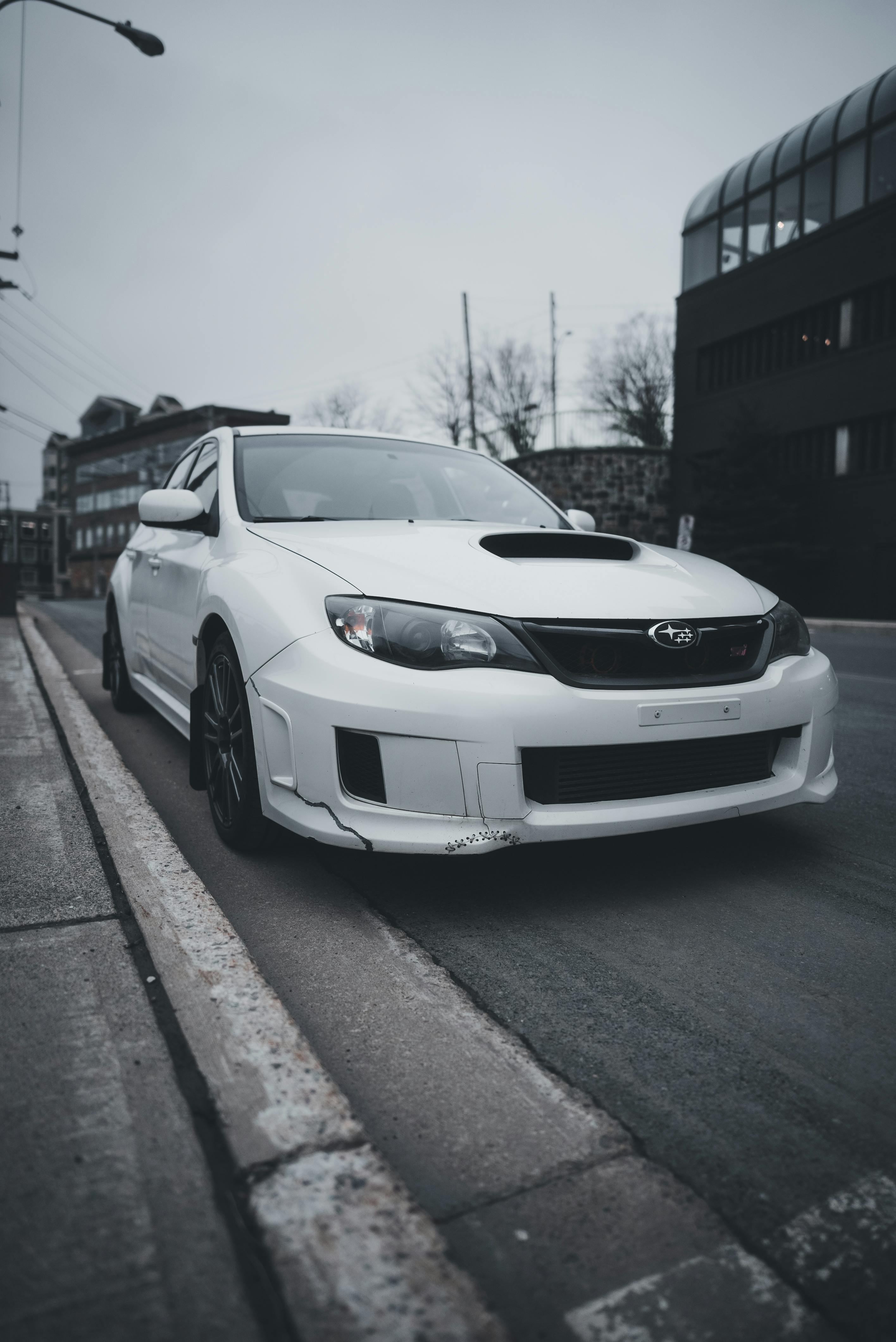 Black Grey and Red Coupe on Grey Concrete Road · Free Stock Photo