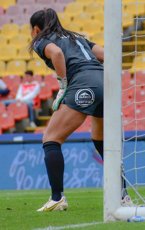 A Female Goalkeeper during a Match 