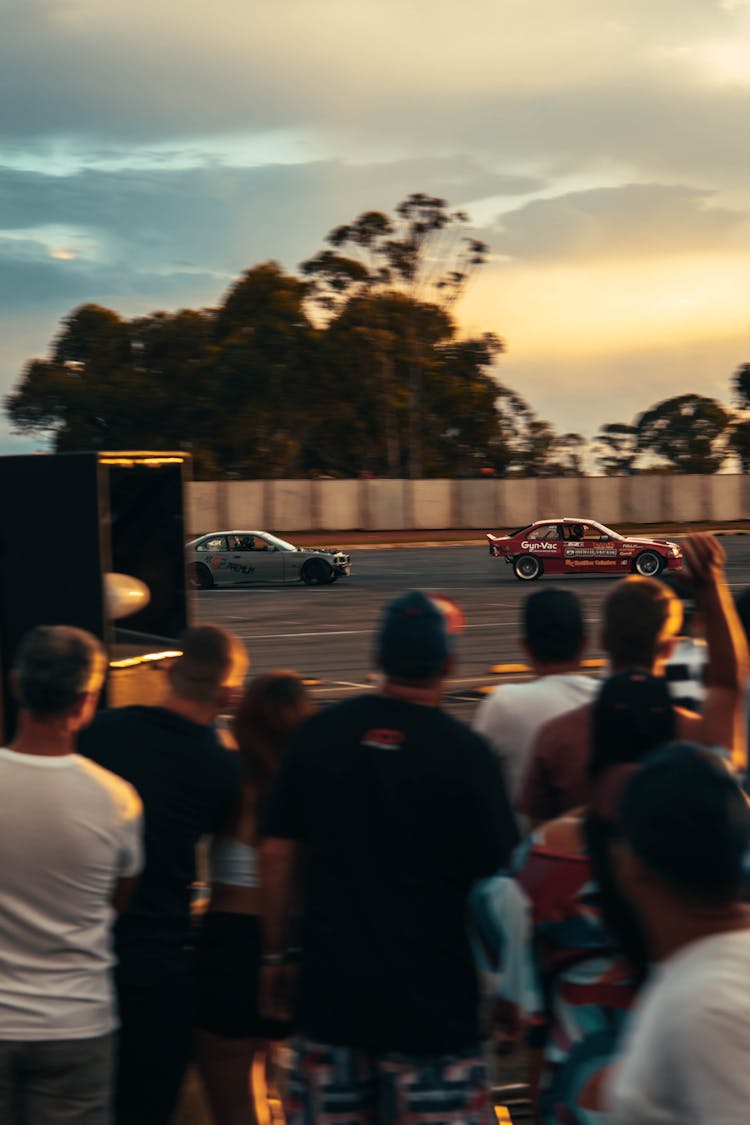 People Watching Cars Racing