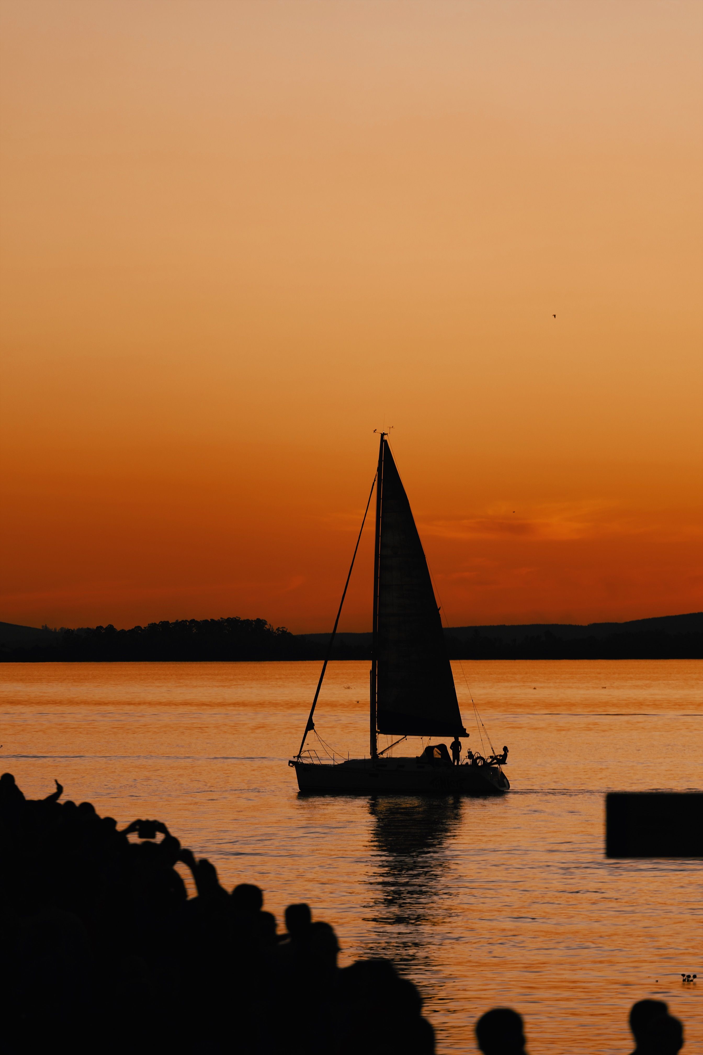 A Sailboat at Dusk · Free Stock Photo