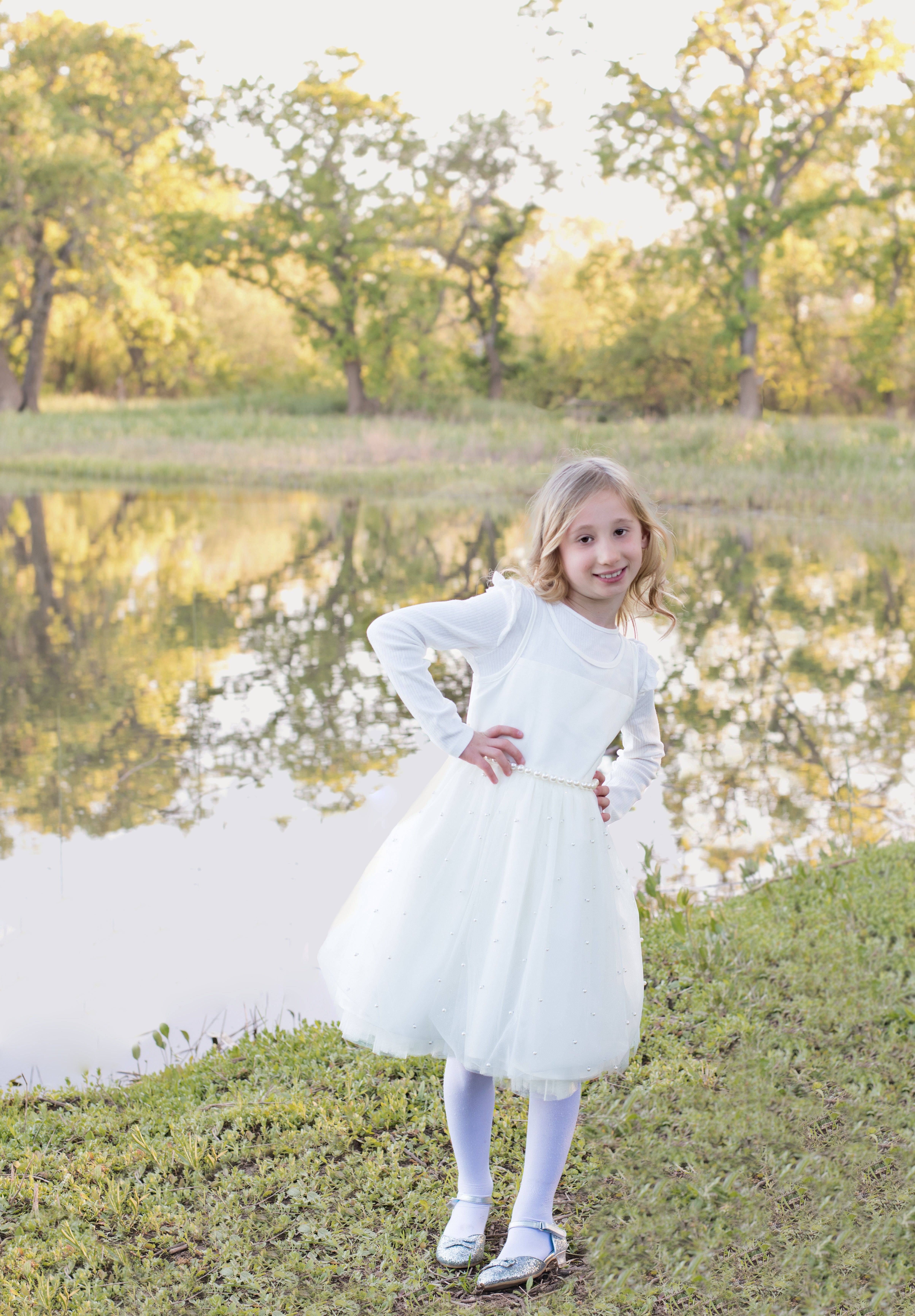 Portrait of a Girl in a White Dress · Free Stock Photo