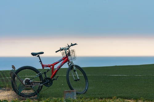 A Bicycle on a Grass Field 