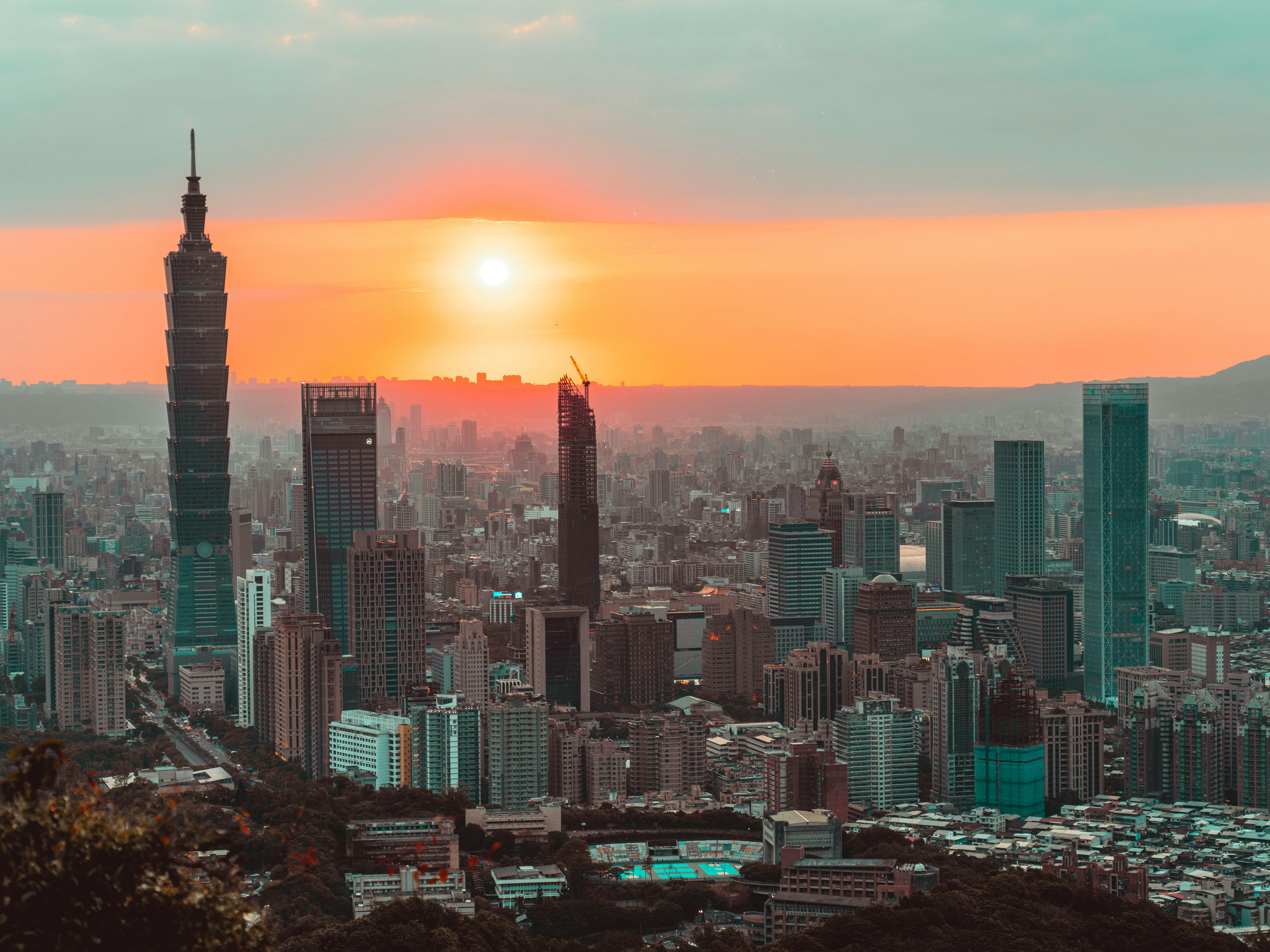 Breathtaking view of Taipei's skyline with iconic Taipei 101 at sunset