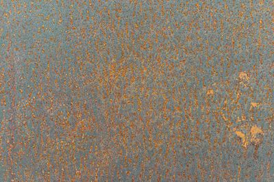 Orange patina on a rusted sheet — photo by Jan Kopřiva on Pexels