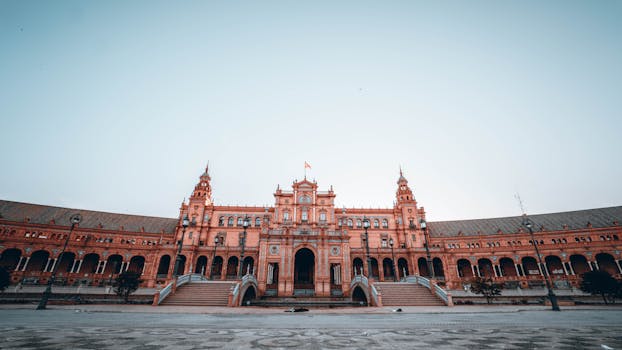 Capture of Plaza de España in Seville showcasing its stunning architecture under a clear sky.