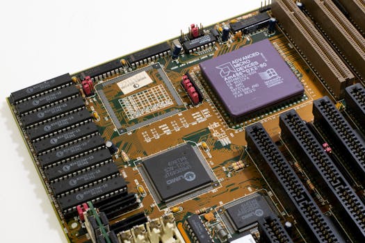Detailed close-up image of a vintage motherboard showcasing microprocessor and components.