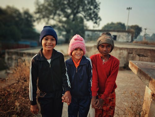 Boys and Girl Holding Hands