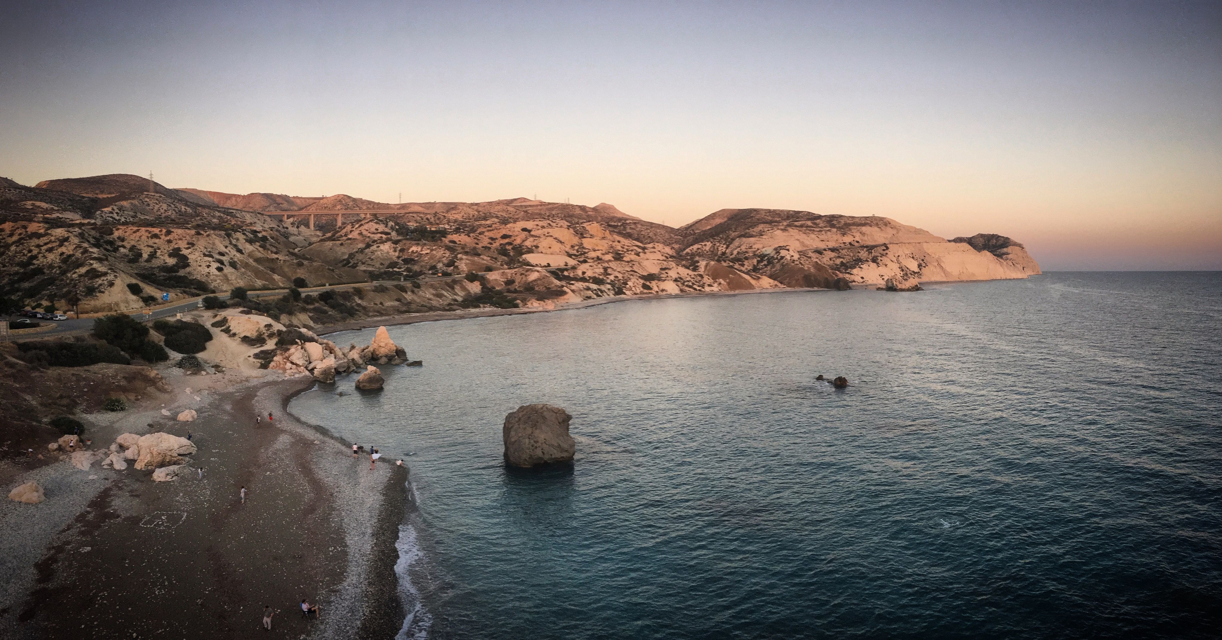 Boutique hotel vs chain hotel Cyprus mood: Cyprus coastline at dusk