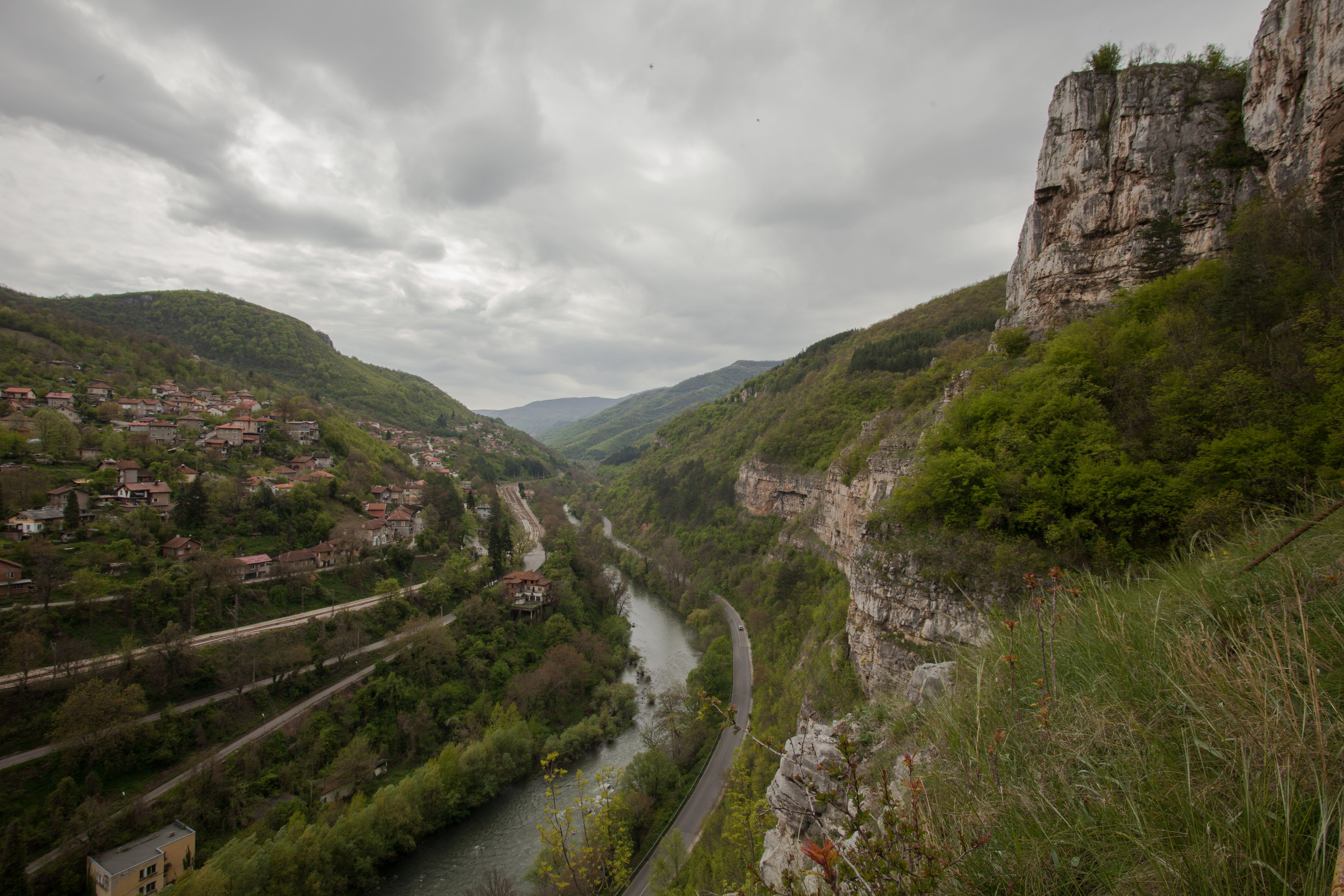 Overcast view of the Iskar Gorge in Bulgaria featuring lush greenery and cliffs. - Bulgaria