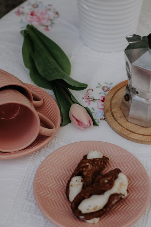 Free Pastries and Tulip on Table Stock Photo