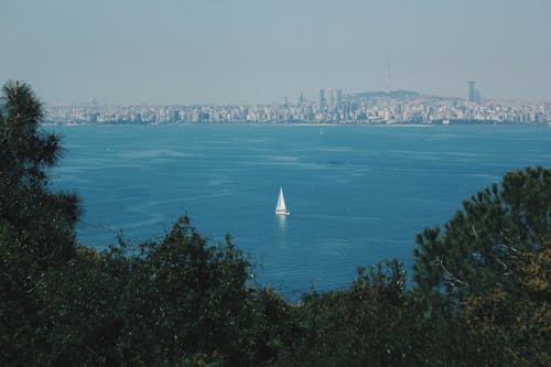 Foto stok gratis kapal besar, kota, laut biru