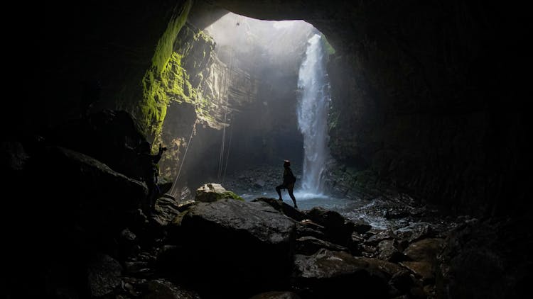 Person Posing In Cave