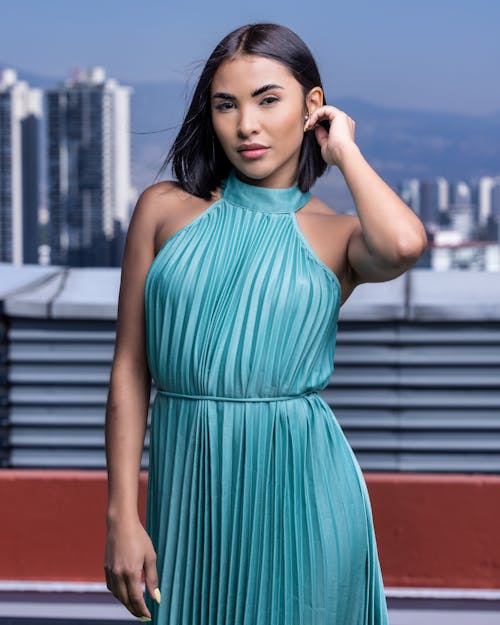 Attractive Model in Turquoise Ruffled Dress