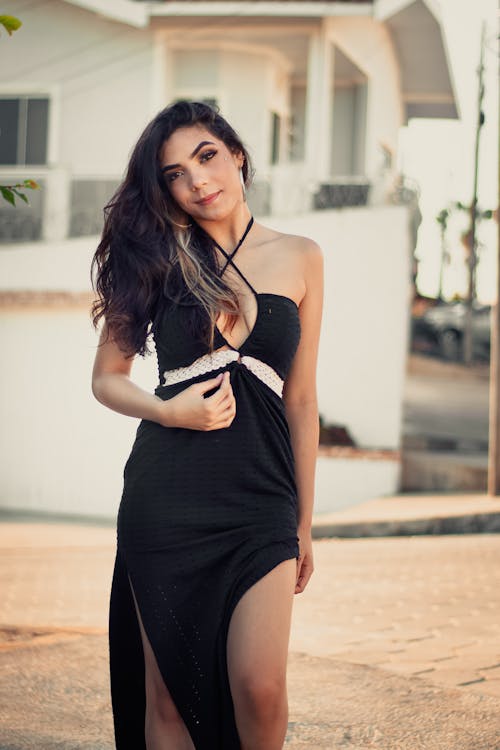 Brunette Woman Posing in Black Dress