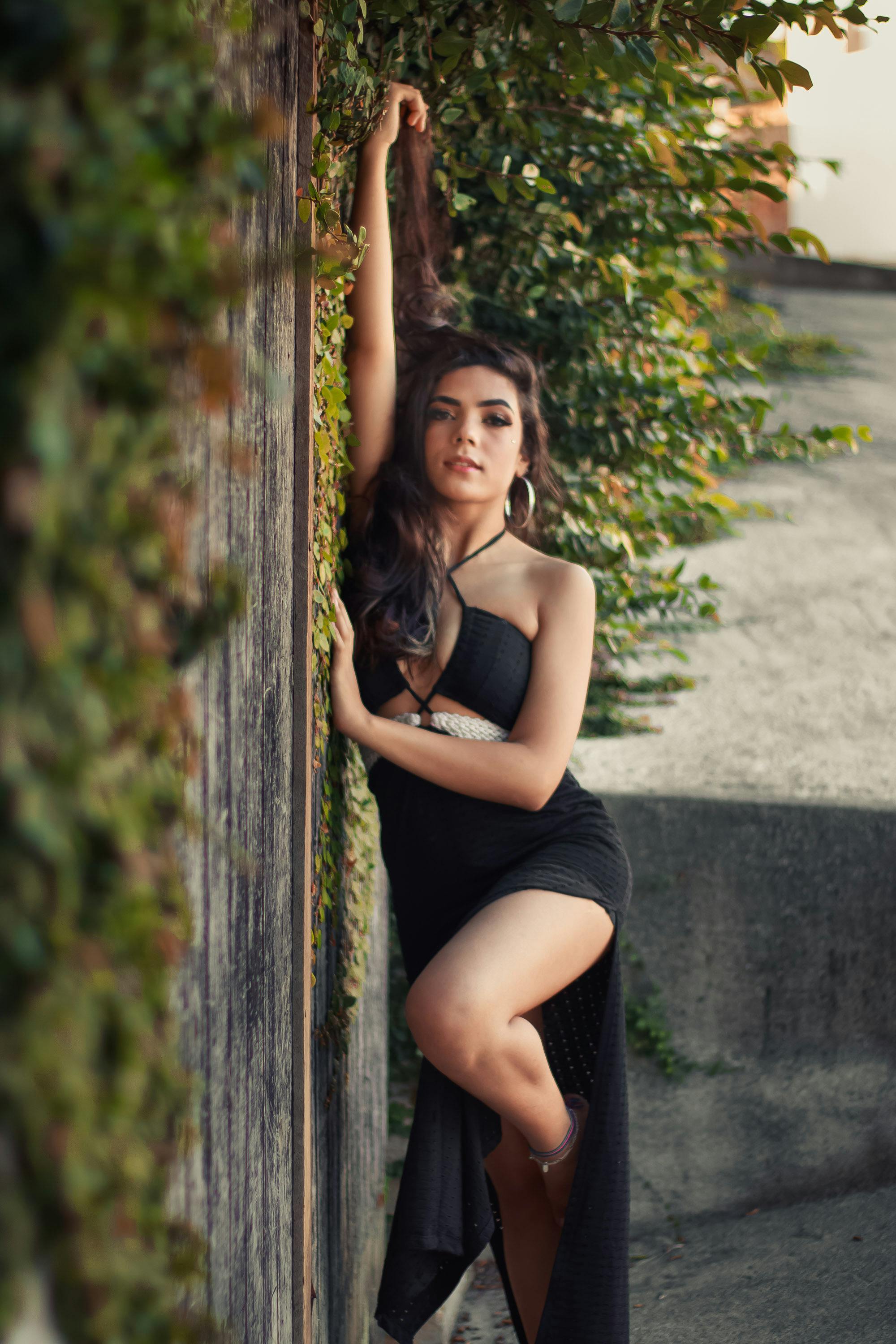 Brunette Posing in Yellow Dress · Free Stock Photo