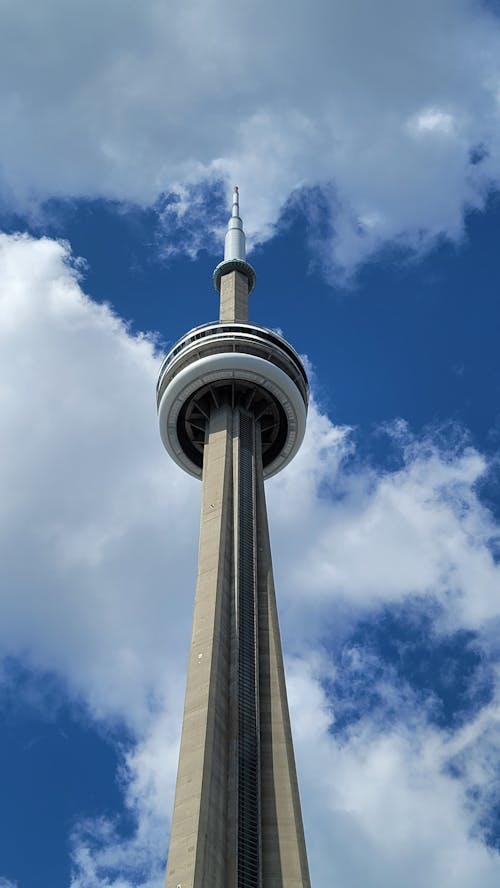 CN Tower against Cloudy Sky in Toronto