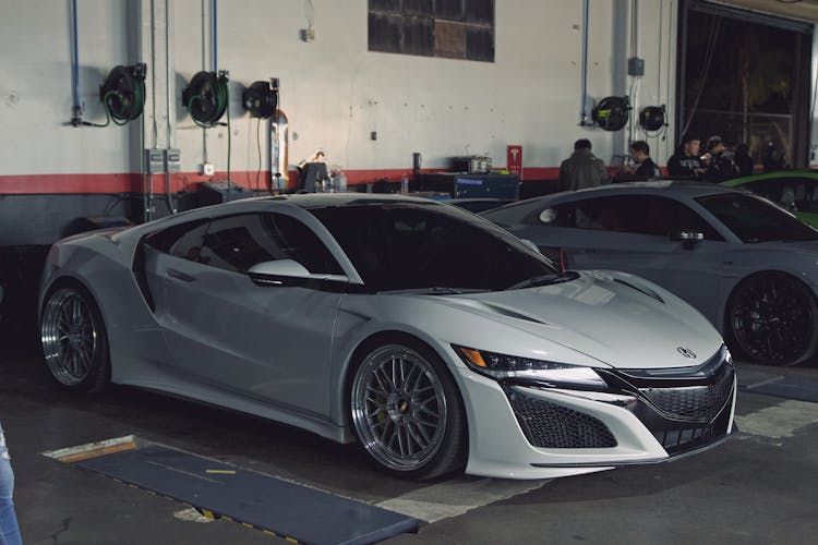 Sports Silver Car In Garage