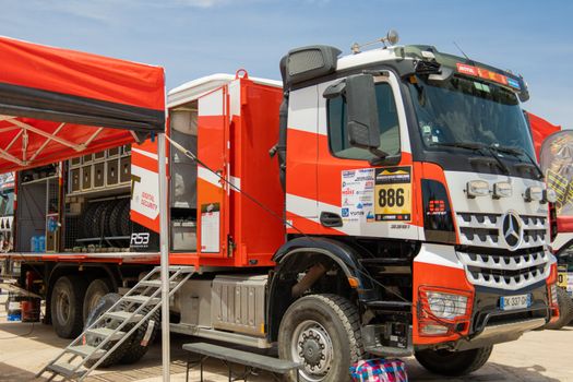 Red Mercedes rally truck