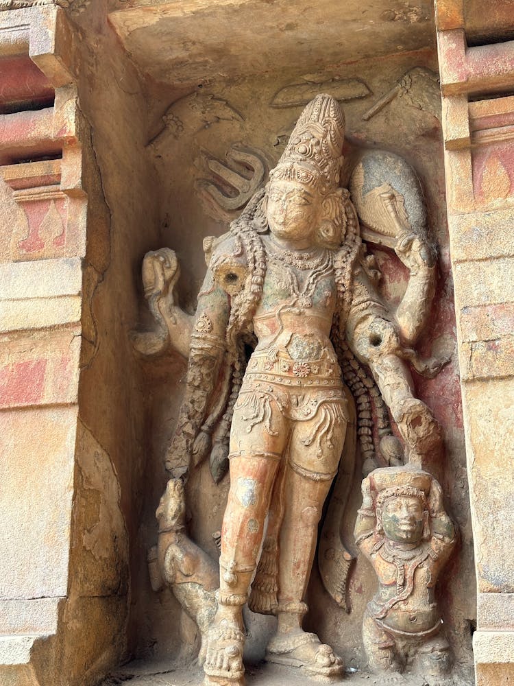 Carved Hindu Deity On The Wall Of A Temple In India 