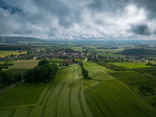 A Rural Landscape under a Cloudy Sky 