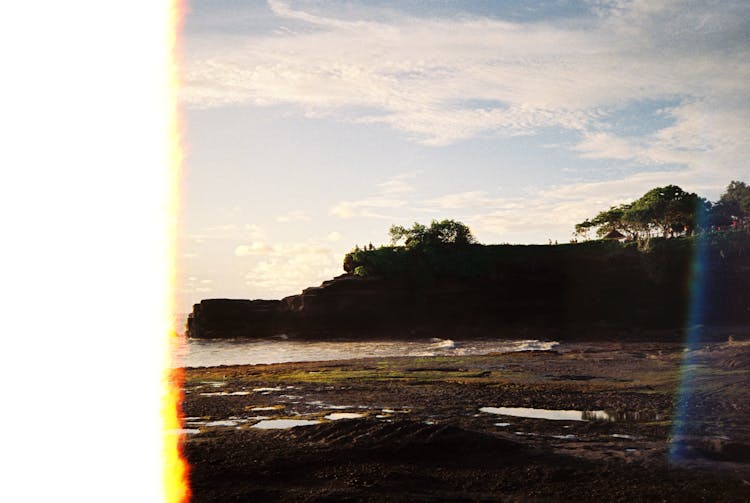 Film Photograph Of The Beach And Cliff 