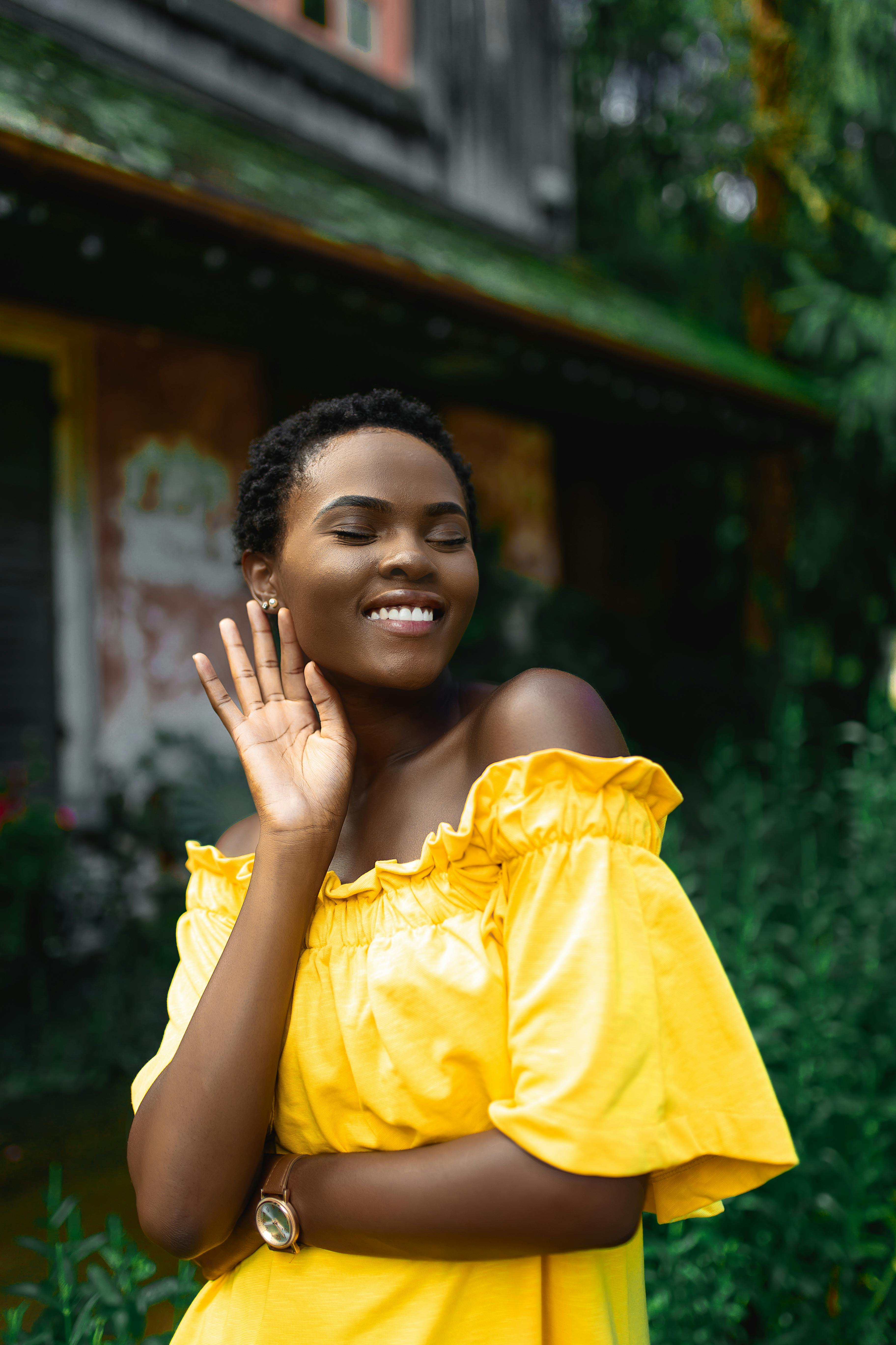 Woman Closes Her Eyes Raising Her Right Hand