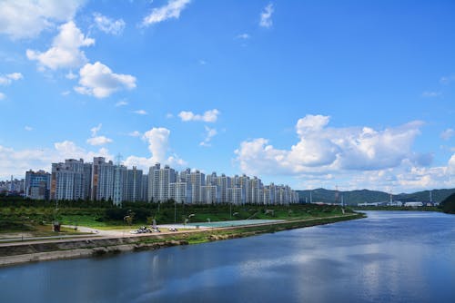 View of a City High Rise Residential Buildings and a River 