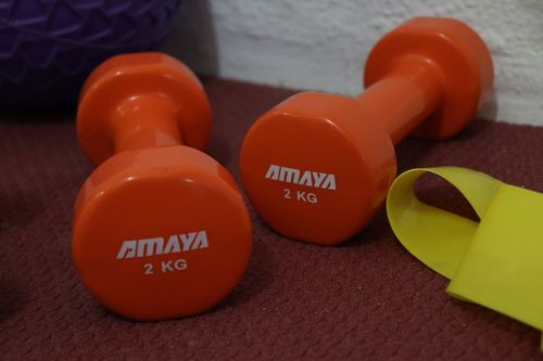 Free stock photo of amarilla, dumbbells, fitness Stock Photo