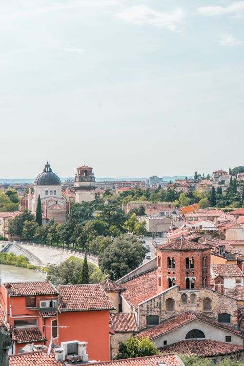 Free Charming rooftops and landmarks of Verona under a clear sky. Stock Photo