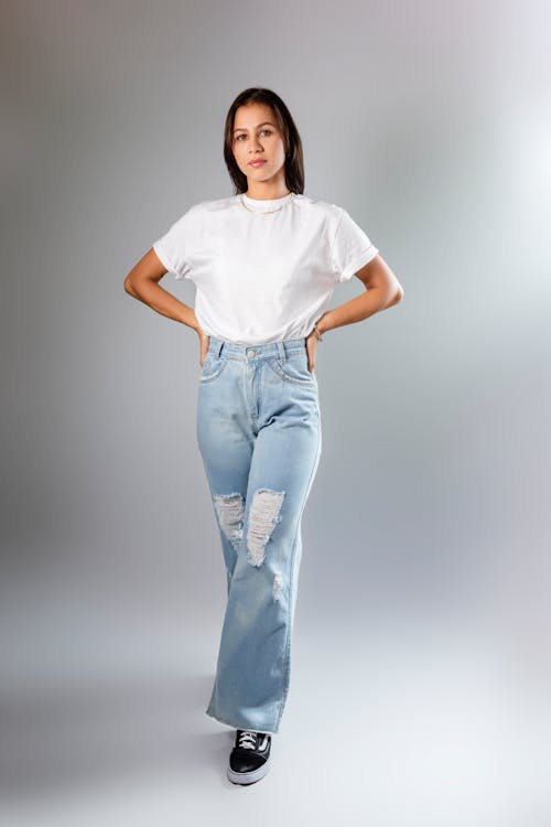 Young Woman in Casual Wear Posing in Studio