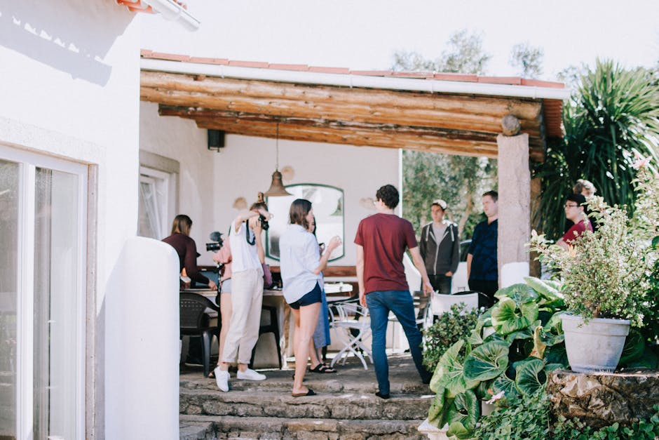 People Standing Under the Awning