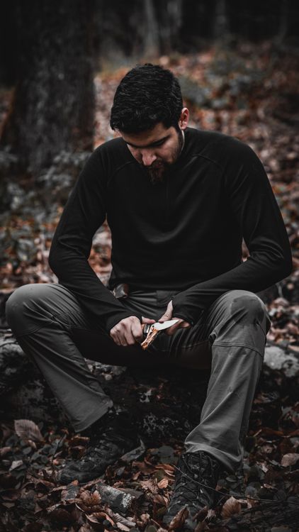 Man Making Ridge Forest Man Making a Fire in a Forest · Free Stock Photo