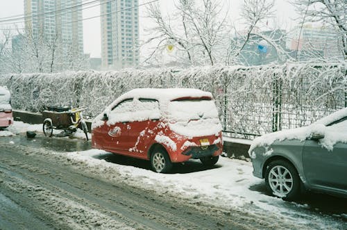 Vehicles on a Street in Winter 