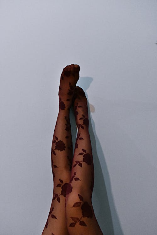 Photo of Woman Wearing Floral Stockings