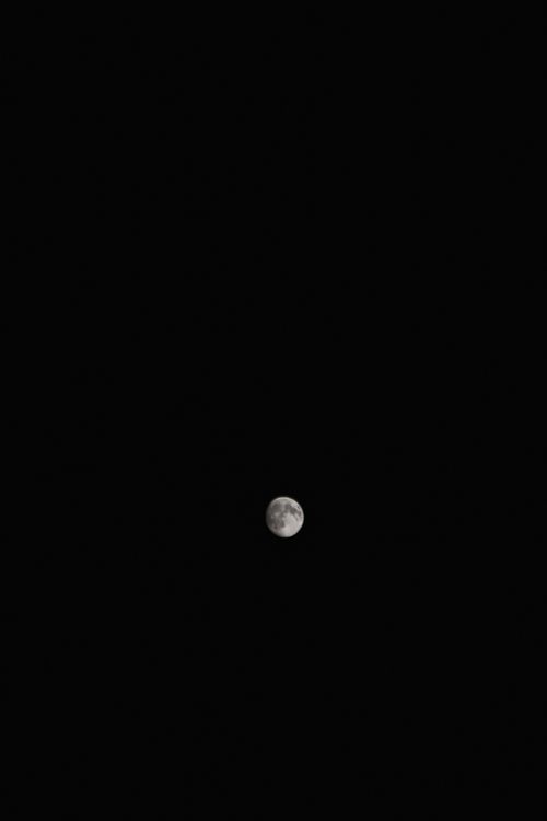 Free A serene full moon against a dark night sky in Rahim Yar Khan, Punjab, Pakistan. Stock Photo