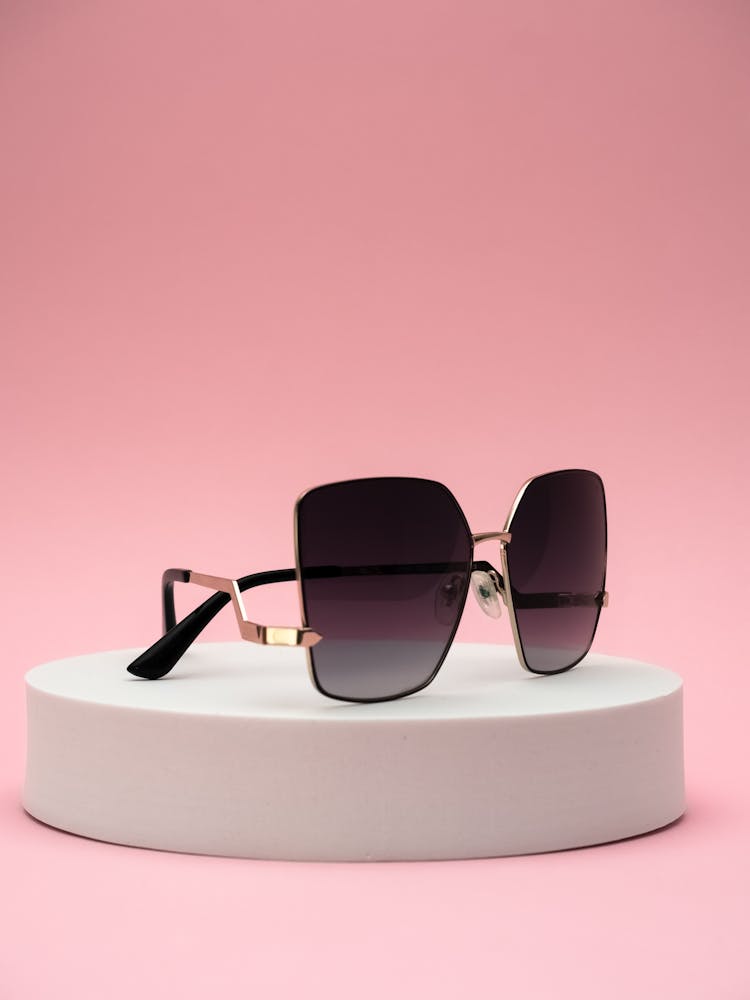 Luxury Sunglasses On Pink Studio Background